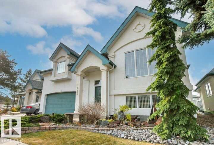 Property Photo:  11686 15 Avenue NW  AB T6J 7E1 