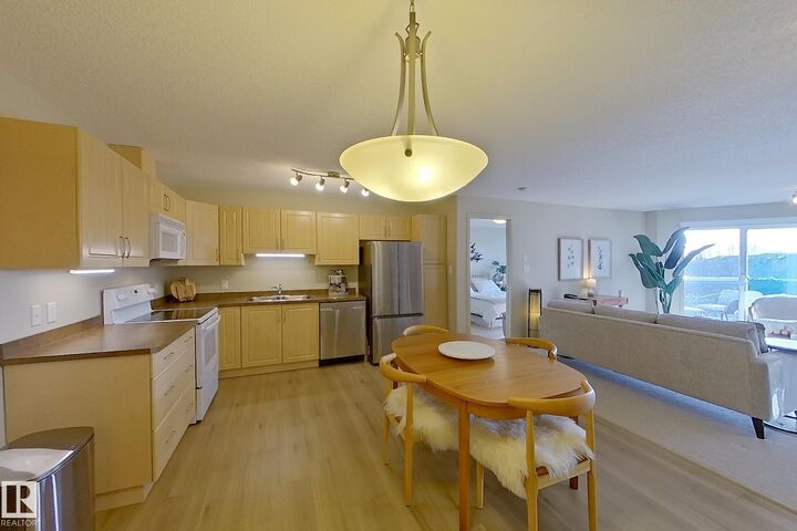 Property Photo: 16035 132 Street NW 328 AB T6V 0B4