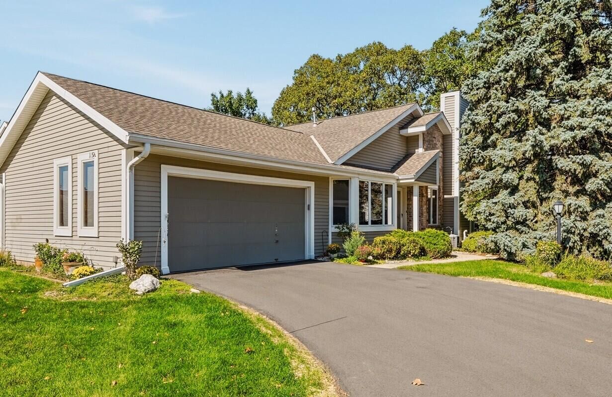 Property Photo:  115 E Sutton Pl  WI 53188 