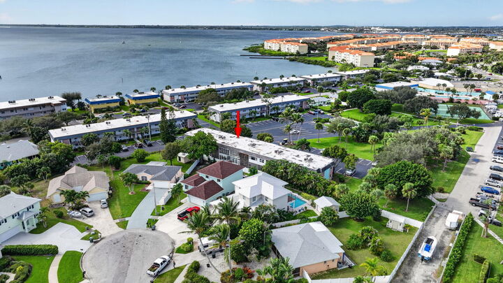 Property Photo:  1200 Colonnades Drive 207  FL 34949 