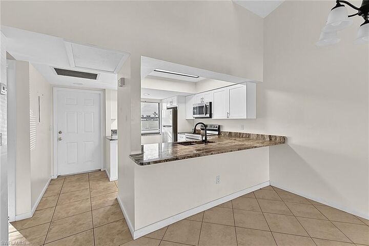 Property Photo:  3739 SW 9th Ave 113  FL 33914 