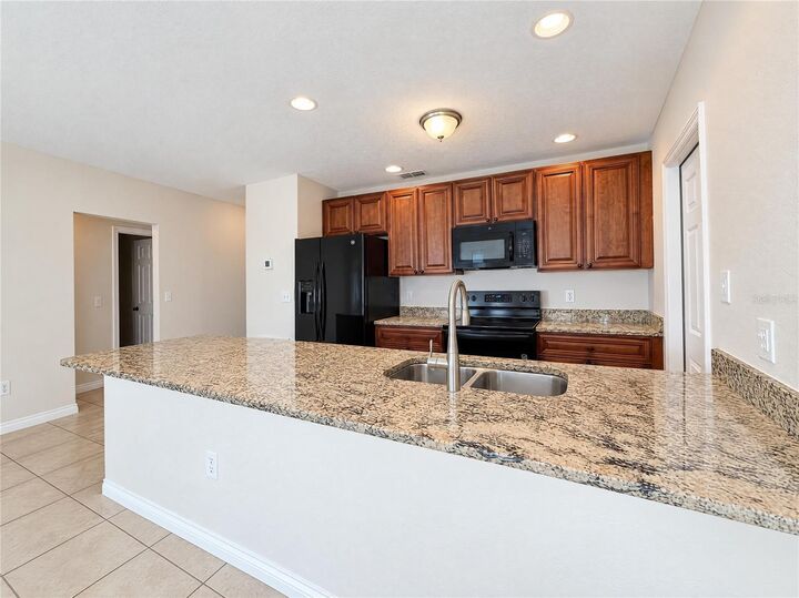 Property Photo:  7606 Leon Avenue  FL 33637 