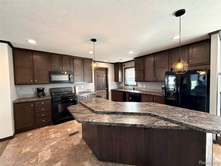 Property Photo: 9784 Birmingham Street MI 48430