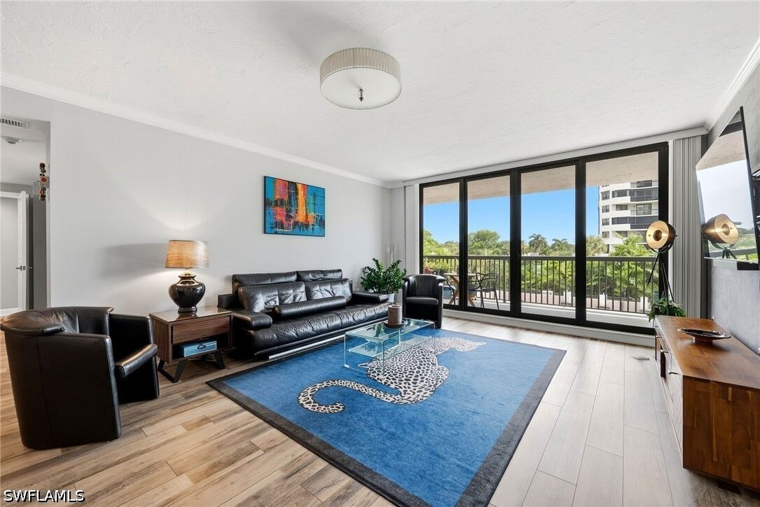 Property Photo:  6075 Pelican Bay Boulevard 203  FL 34108 