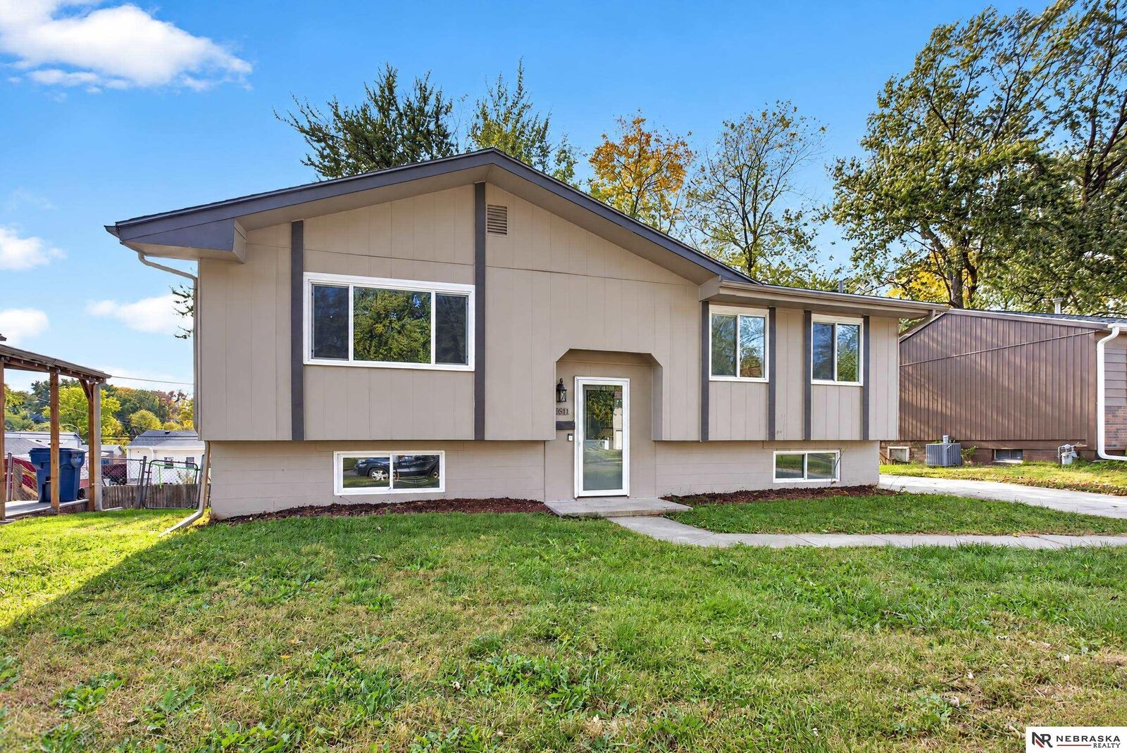 Property Photo: 7611 Teal Street NE 68128