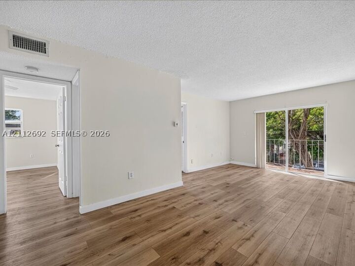 Property Photo:  1111 NW 19th Ave 205  FL 33125 