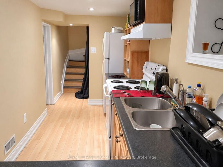 Property Photo:  211 Melita Avenue Lower  ON M6G 2A1 