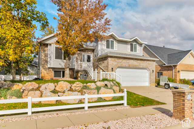 Property Photo: 1671 E 2550 N UT 84040