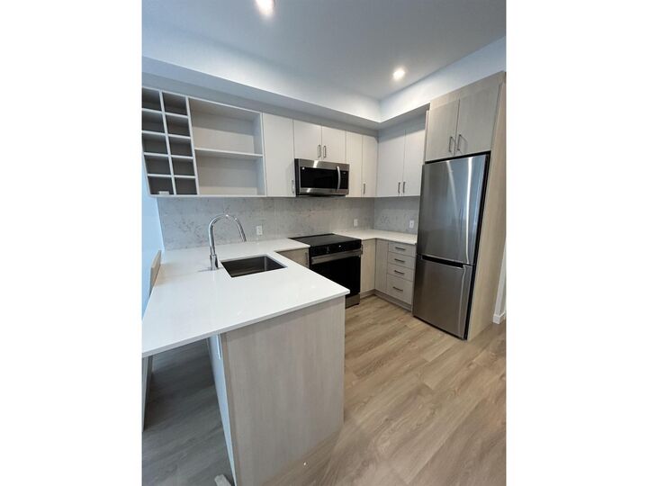 Property Photo:  13858 108 Avenue E410  BC V3T 0T8 