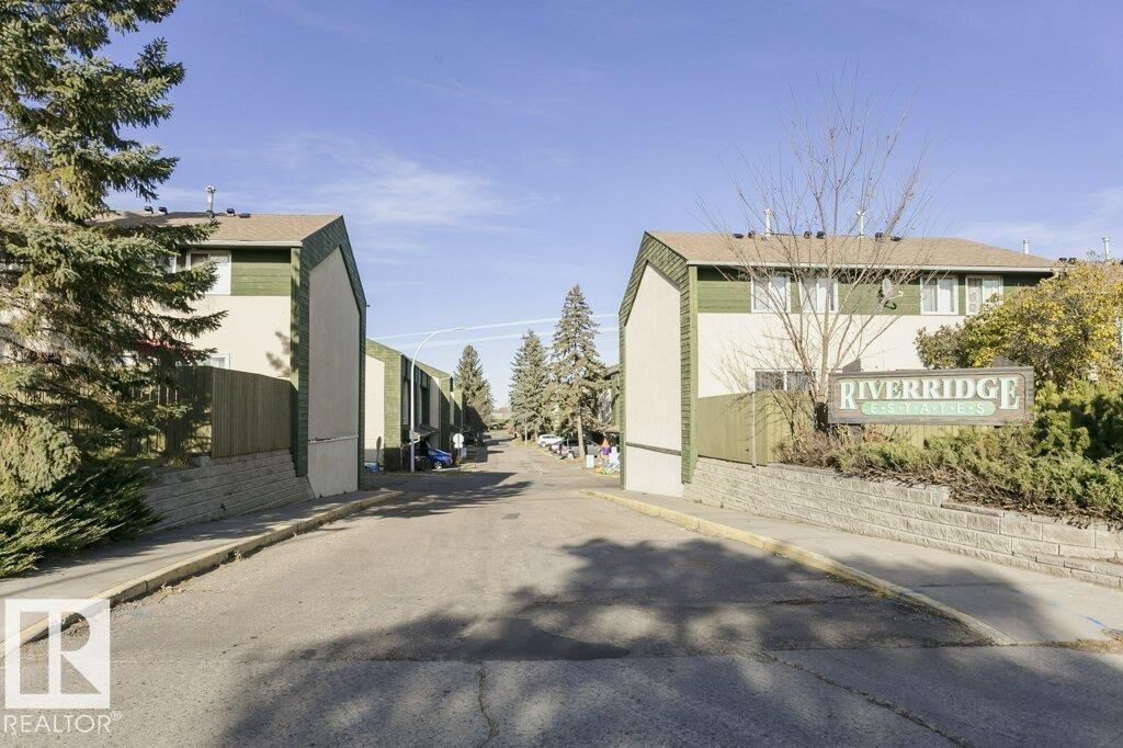Property Photo:  879 Abbottsfield Road NW  AB T5W 4R4 