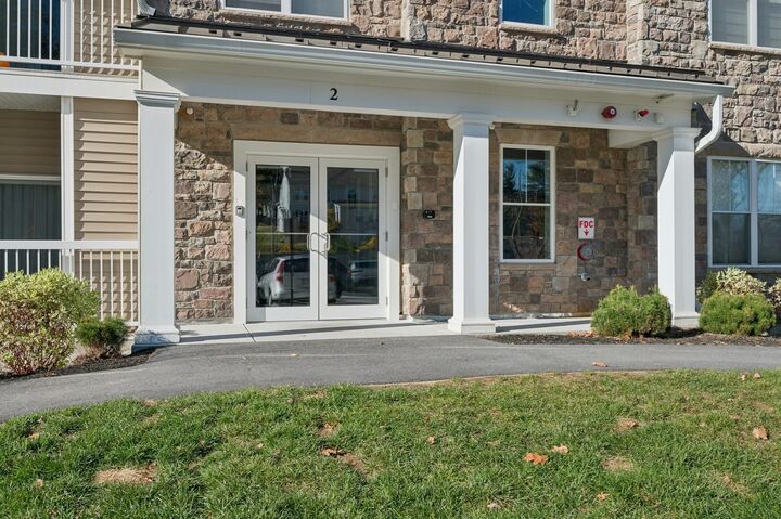 Property Photo:  2 Winslow Ln 207  MA 01536 