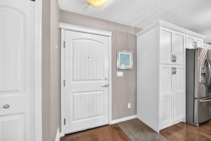 Property Photo:  130 Panatella Street NW 1305  AB T3K 0Y6 