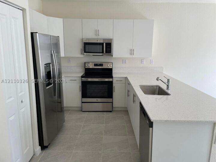 Property Photo: 11407 W 34th Ct FL 33018