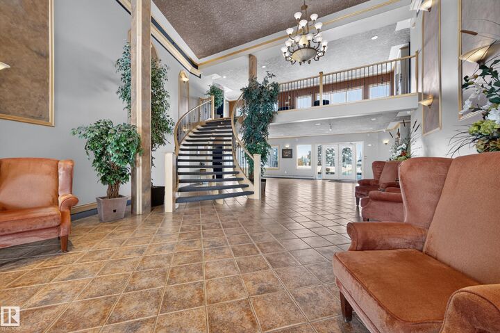 Property Photo: 100 Foxhaven Drive 414 AB T8A 6B6