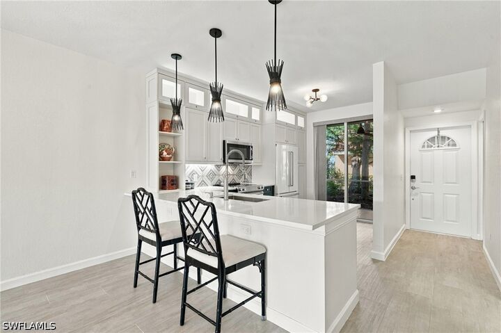 Property Photo: 1685 Windy Pines Drive 1 FL 34112