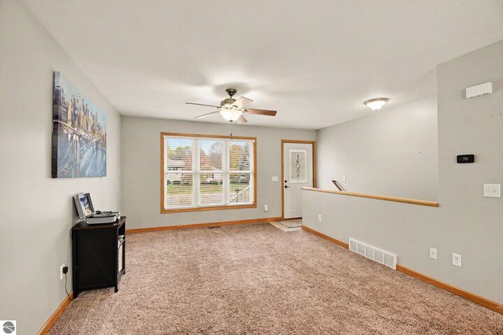 Property Photo: 106 E Saint Andrews Drive MI 48640
