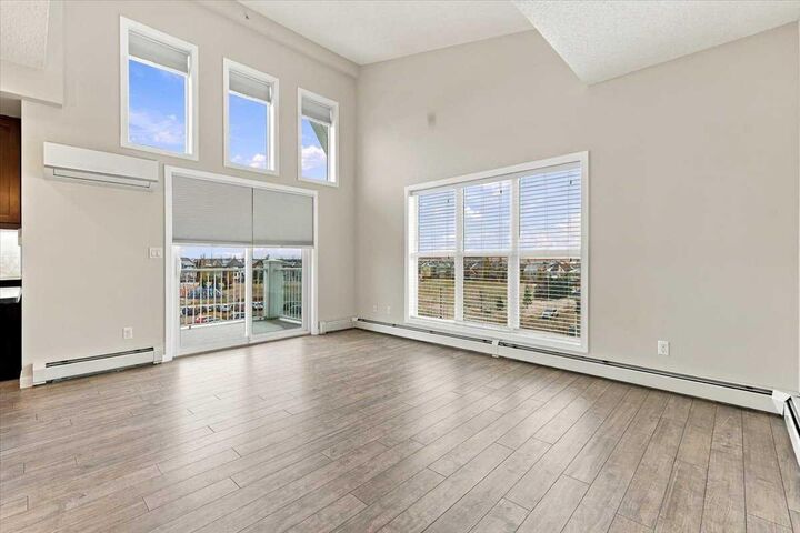 Property Photo:  402 Marquis Lane SE 420  AB T3M 2G7 