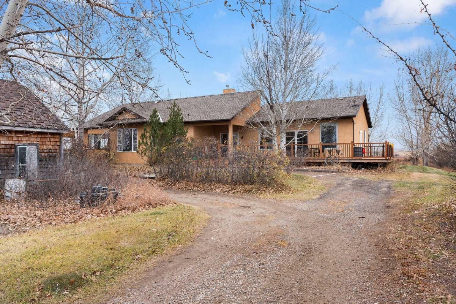 Property Photo:  255026 Range Road 241  AB T1P 0K9 