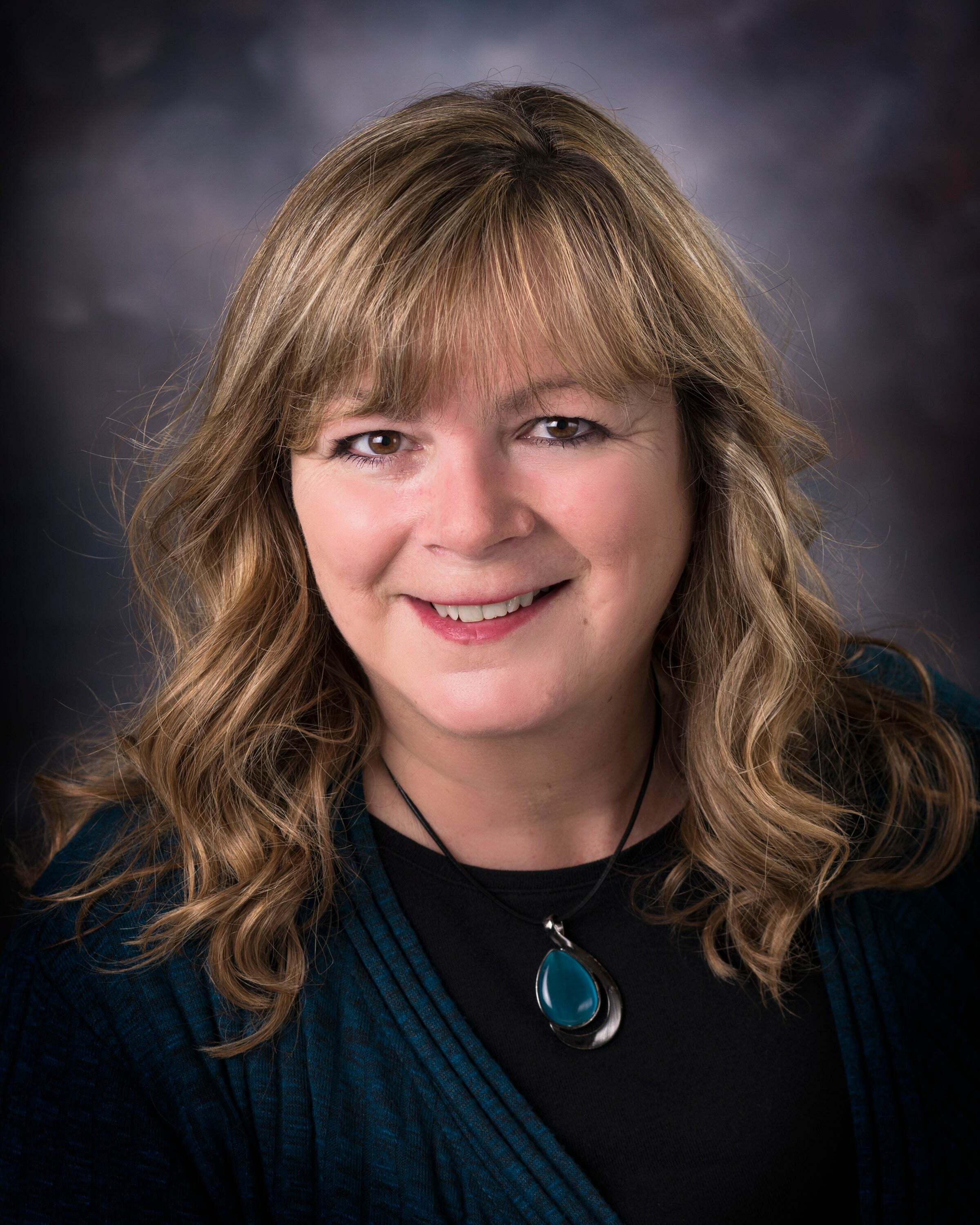 Jody McLaughlin, Real Estate Salesperson in Schofield, Action