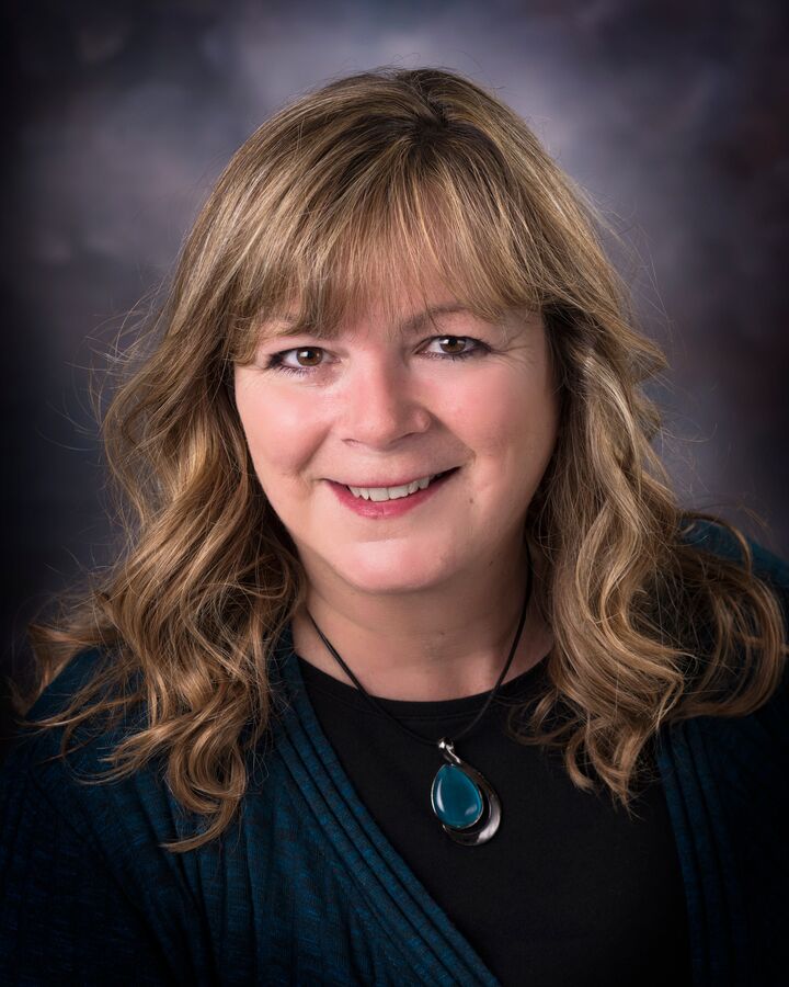 Jody McLaughlin, Real Estate Salesperson in Schofield, Action