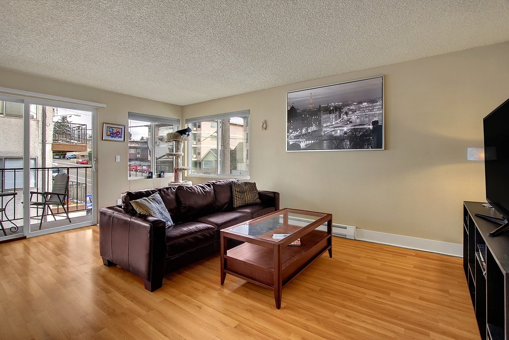 Property Photo: Living room 6501 24th Ave NW 204  WA 98117 