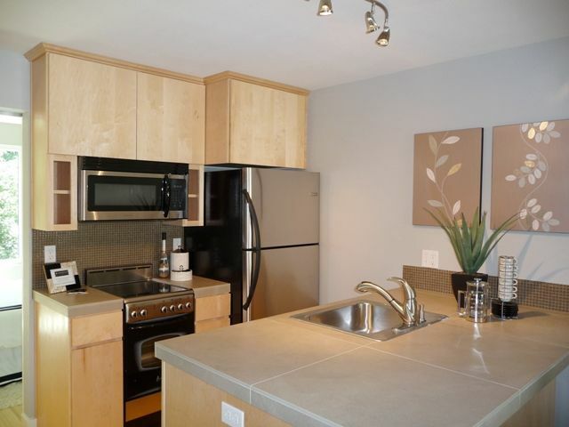 Property Photo: Interior photos of staged unit NW 20th Ave #103  OR 97210 