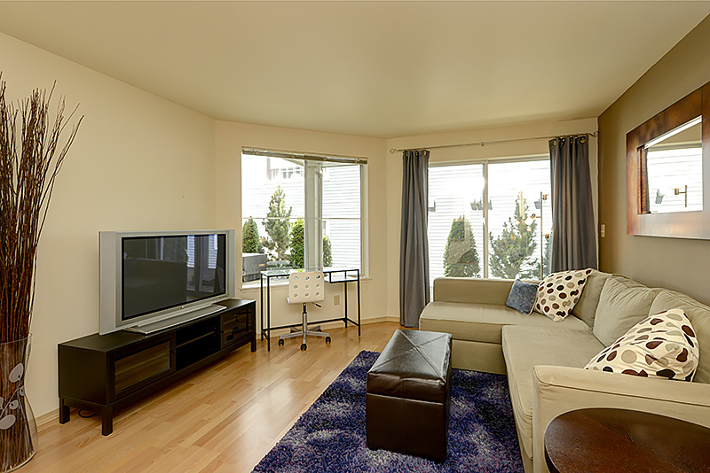 Property Photo: Living room 6960 California Ave SW 106  WA 98126 