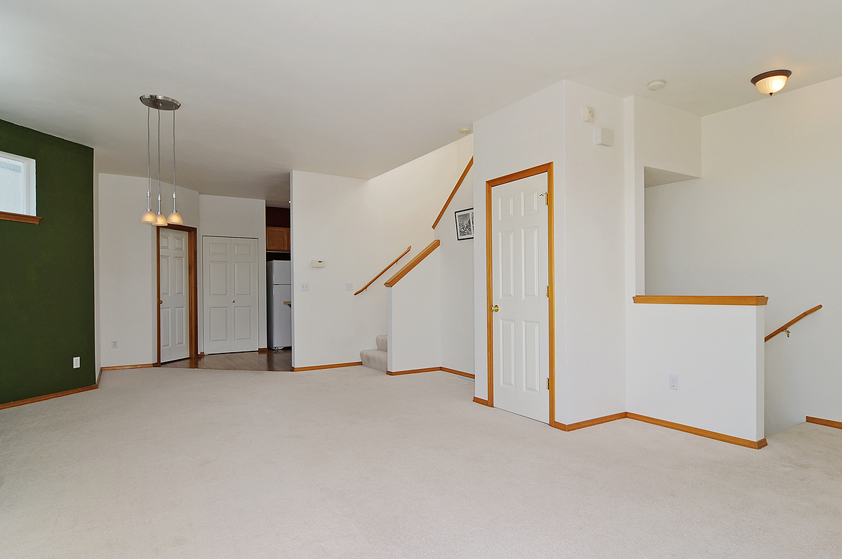 Property Photo: Living room, dining room, kitchen & bathroom 11326 25th Ave NE D  WA 98125 