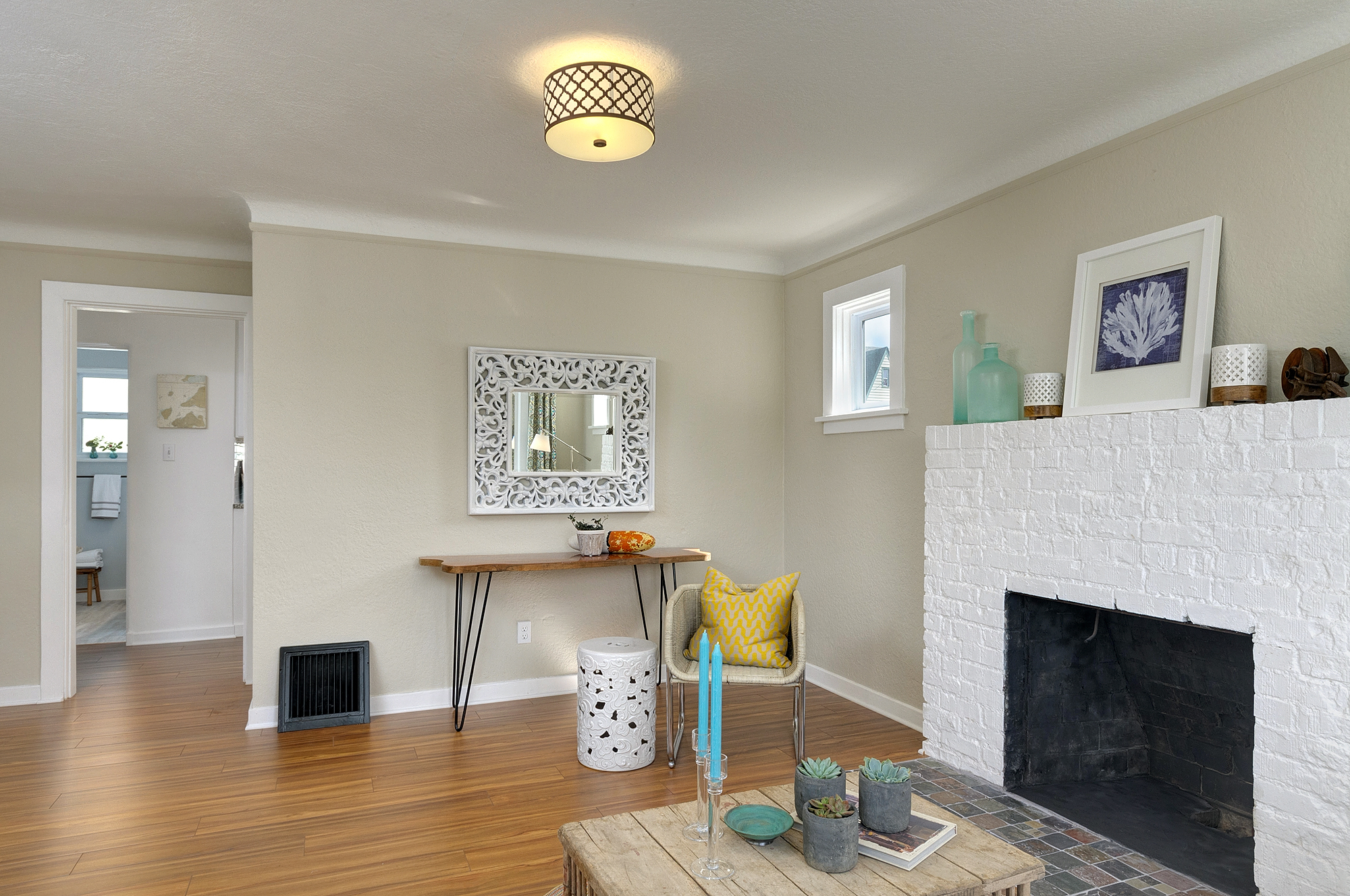 Property Photo: Light, open livingroom with wood burning fireplace 2502 9th St  WA 98312 
