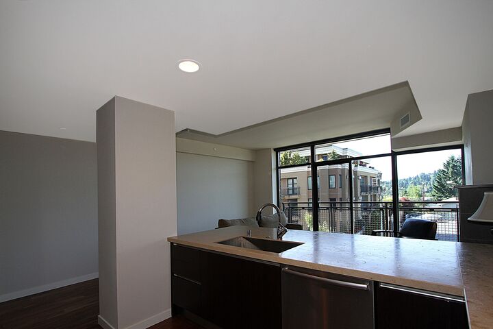 Property Photo: Living room 10000 Main St 309 WA 98004